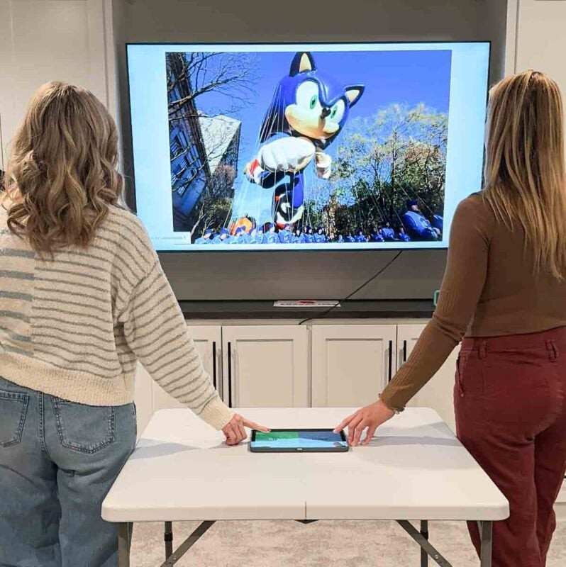 Players engrossed in a 'Floor Inspired Thanksgiving Game'