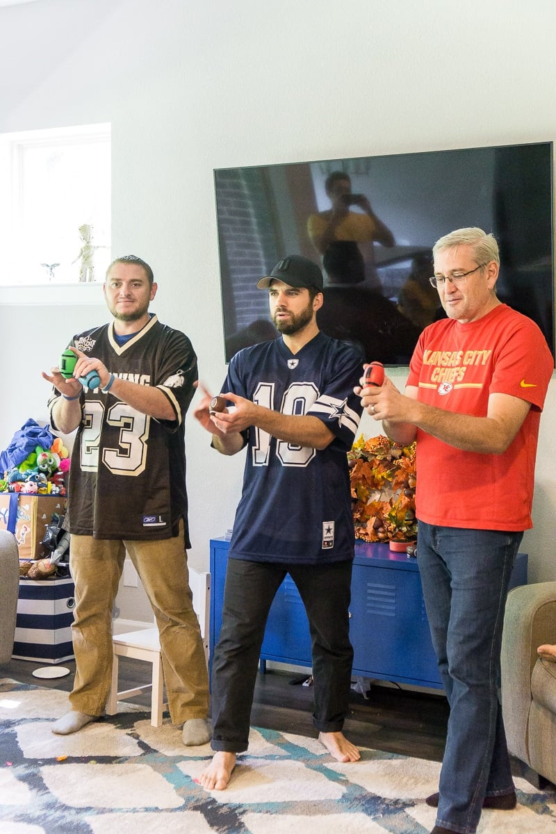 Hilarious moment of flicking footballs during a Thanksgiving family game
