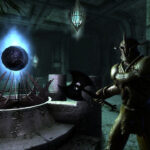 A person in armor stands beside a glowing orb