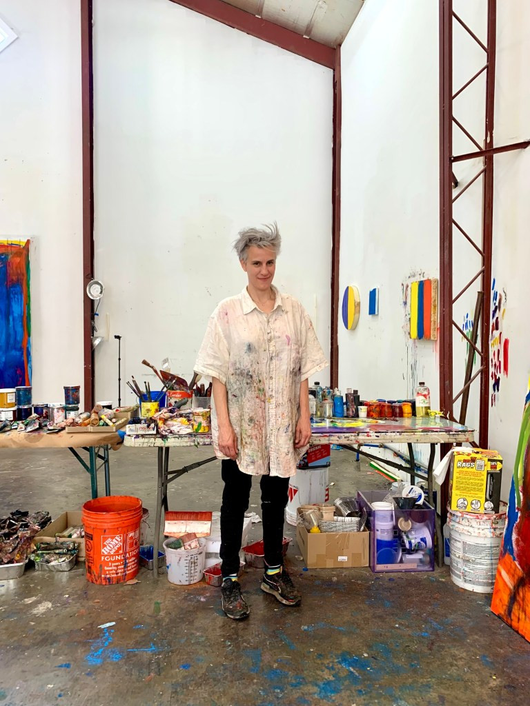 Astrid Dick in her studio, reflecting on the artistry of football