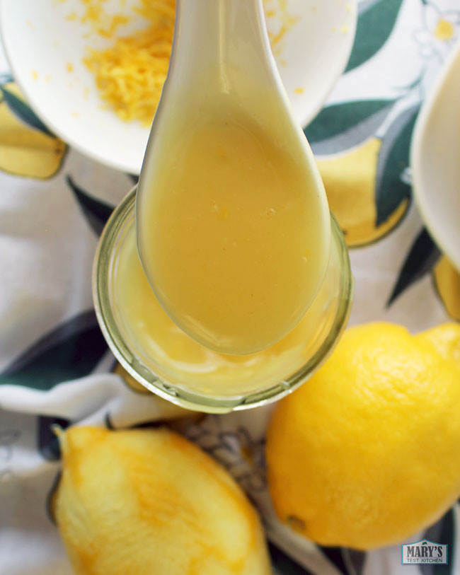 Vegan lemon curd on a spoon