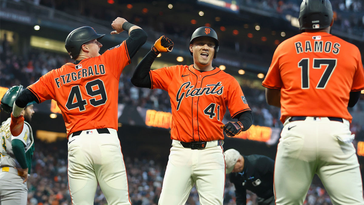 Wilmer Flores is celebrated for his contributions as he helps the Giants win a crucial game.