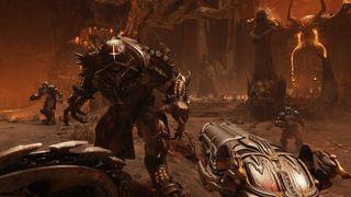Screenshot from the video game Doom: The Dark Ages. A first person shooter game where you blast demons in Hell. There are several enemies across the scorched landscape. They are wearing medieval armor with a sci-fi twist. The protagonist is wielding a shotgun and a shield.