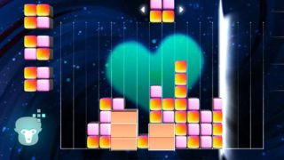 Lumines Electronic Symphony PS Vita gameplay showcasing colorful block puzzles synched to music.