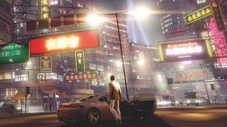 A screenshot of a man wearing a white suit looking out onto the city during the game Sleeping Dogs