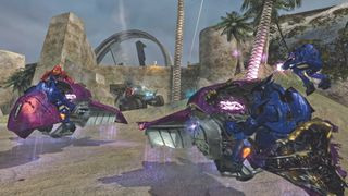 A group of players driving sci-fi motorcycles during one of the best Halo games, Halo 2.