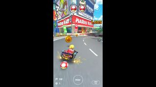 Mario Kart Tour gameplay featuring classic Mario characters and mobile-optimized racing