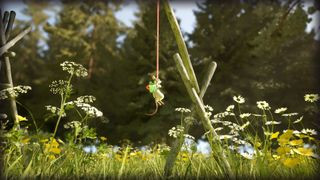 Hela screenshot showing a mouse dangly from a read thread over some flowery fields