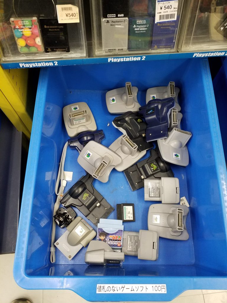 Close-up of items in the &quot;junk&quot; section with Japanese price tags