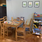 Players can choose from more than 200 titles in the store, with tables set up for board games, card games and puzzles. board game selections