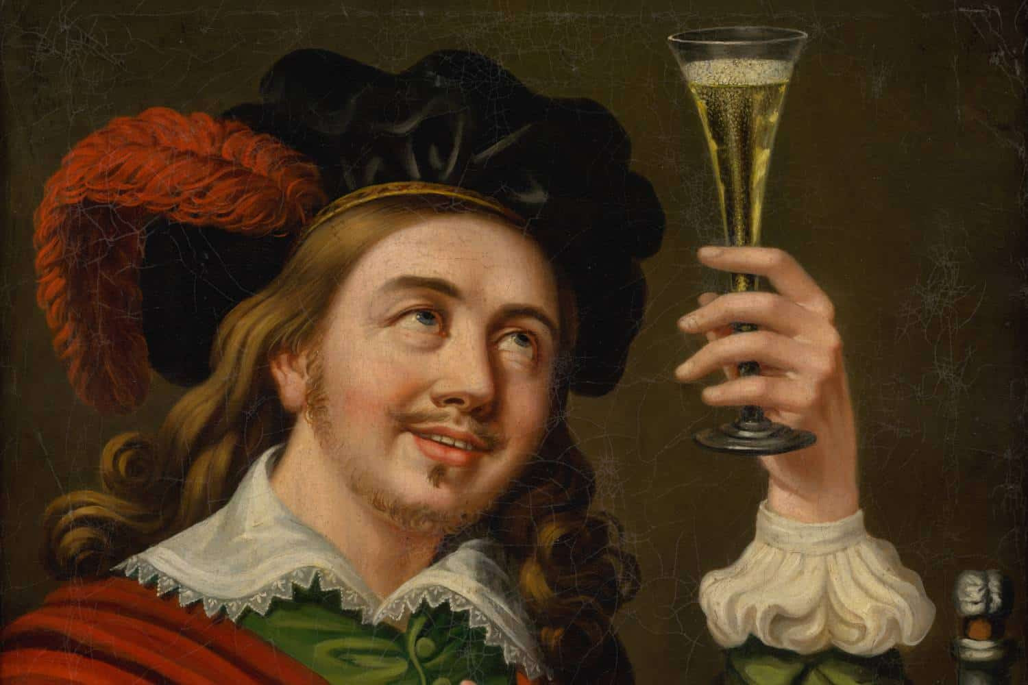 People raising their glasses in a drinking game