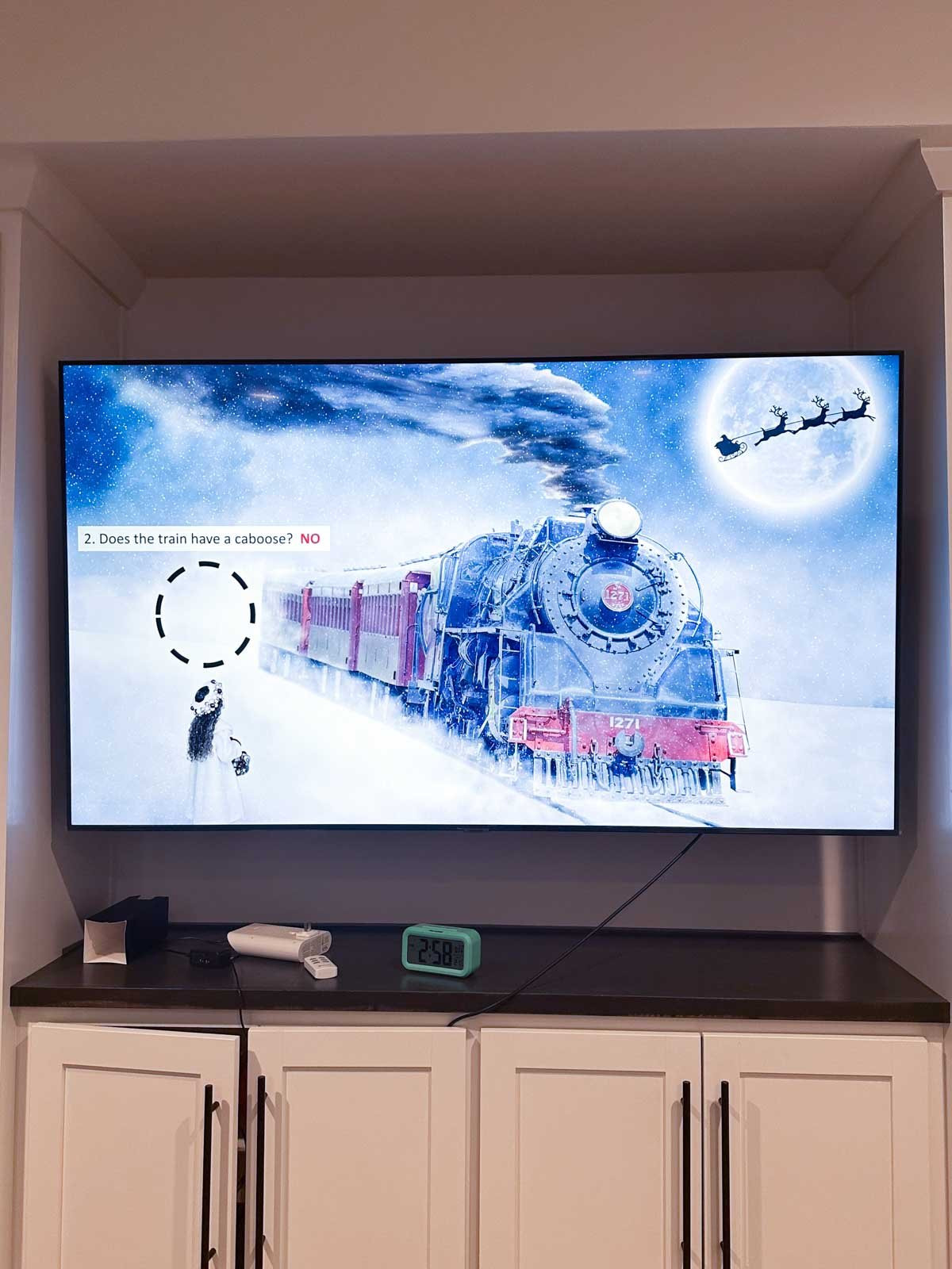 A picture of a Christmas train with an answer on it