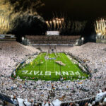 Penn State White Out Game Crowd "White Out game at Beaver Stadium, as fans dressed in white create a visually striking scene during a Penn State football game."