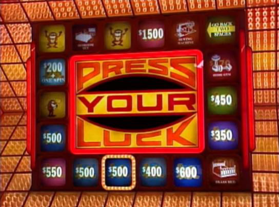 Contestants spinning the board in Press Your Luck.