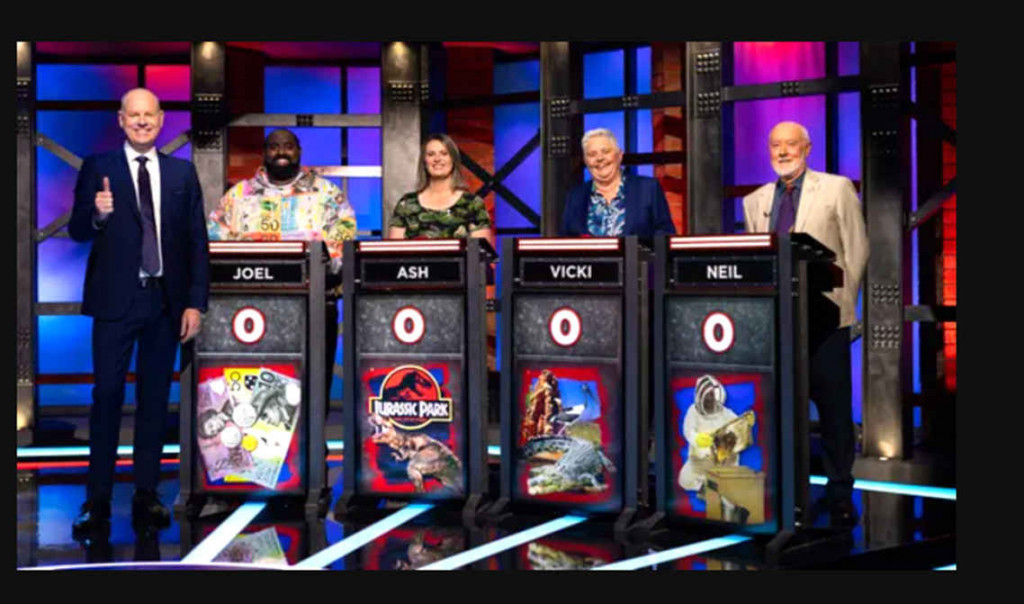The host of Hard Quiz with a contestant.