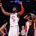 Joel Embiid #21 of the Philadelphia 76ers reacts during the fourth quarter of the game against the New York Knicks at Madison Square Garden on December 25, 2022 in New York City. NOTE TO USER: User expressly acknowledges and agrees that, by downloading and or using this photograph, User is consenting to the terms and conditions of the Getty Images License Agreement.