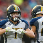 Kavan Markwood pulls on his gloves during a South Allegheny High School football game against Serra Catholic on Aug. 28, 2021 in McKeesport, Pennsylvania