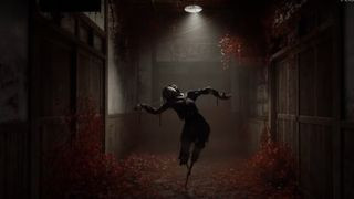 A monster standing in a hallway that