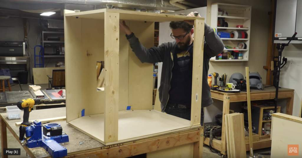 Constructing the control section with joystick and button layout for a Mortal Kombat arcade cabinet