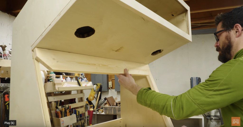 Assembling the final structure of the Mortal Kombat arcade cabinet